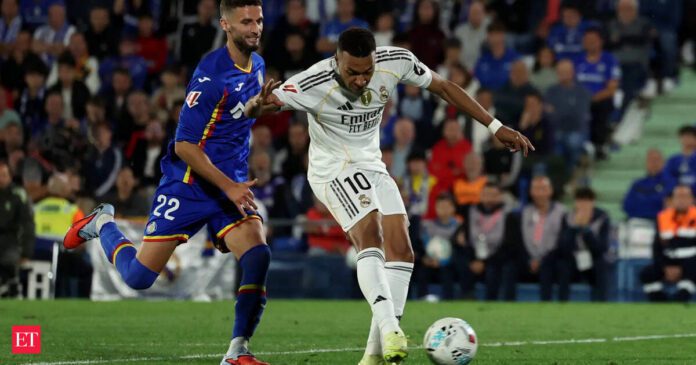Kylian Mbappé late strike sends Real Madrid top of La Liga table against nine-man Getafe